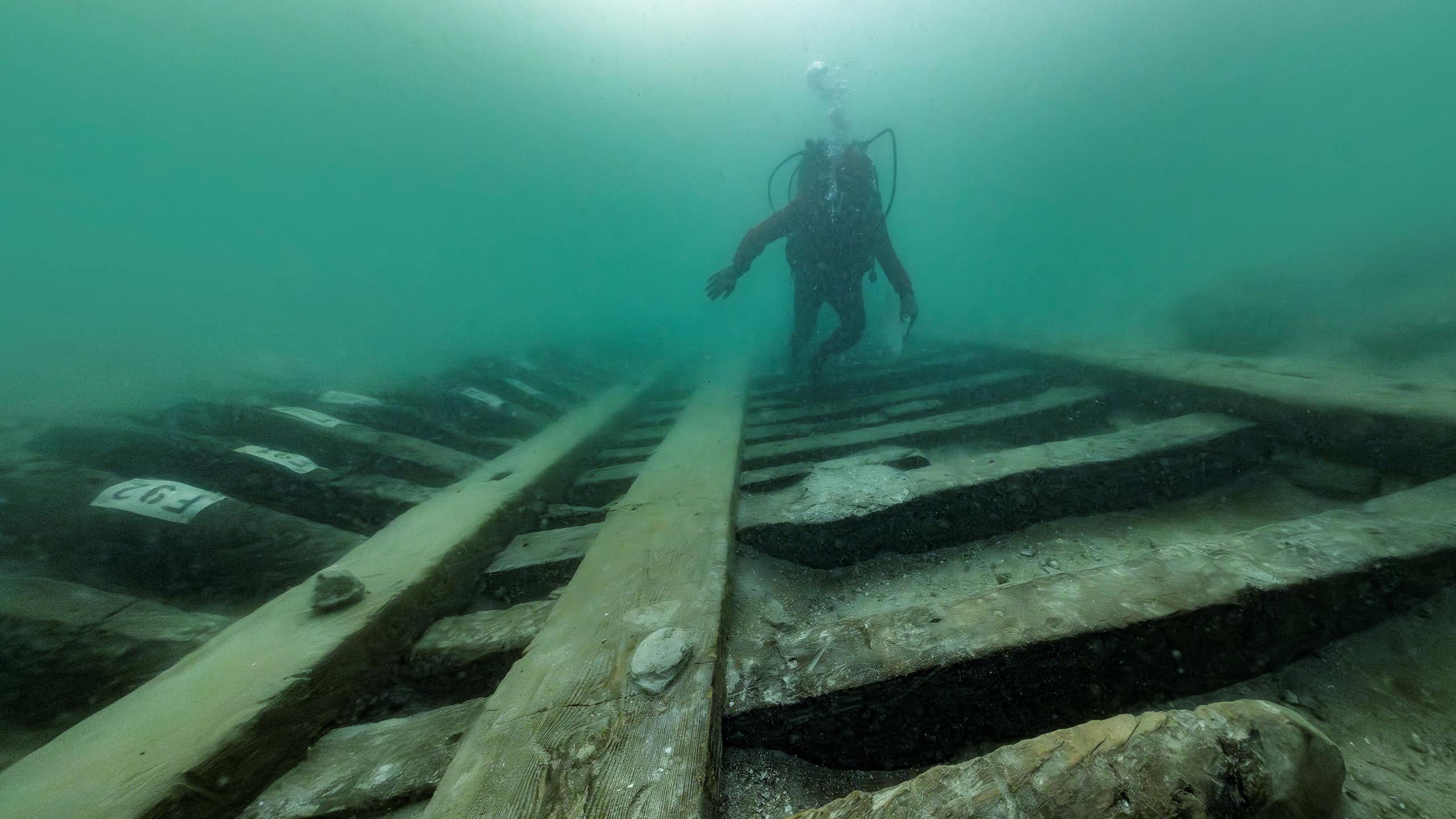 Divers examining the wreck.