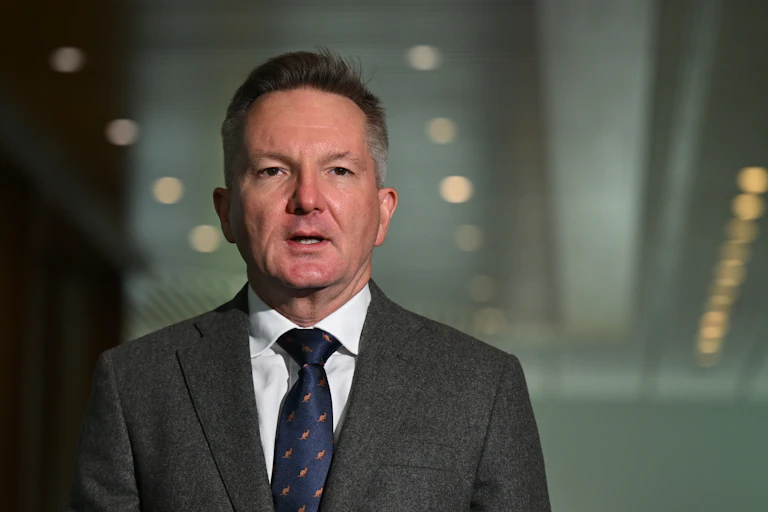 Chris Bowen at a press conference