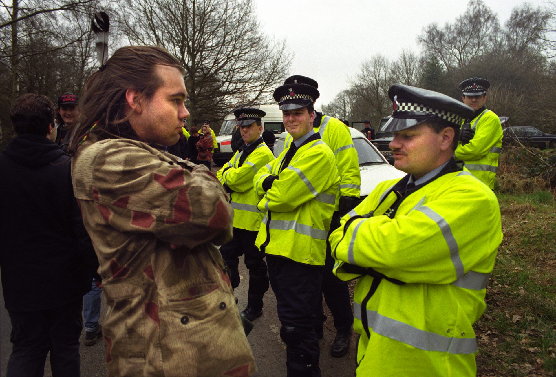 A hunt saboteur faces Surrey police officers in the mid-1990s.