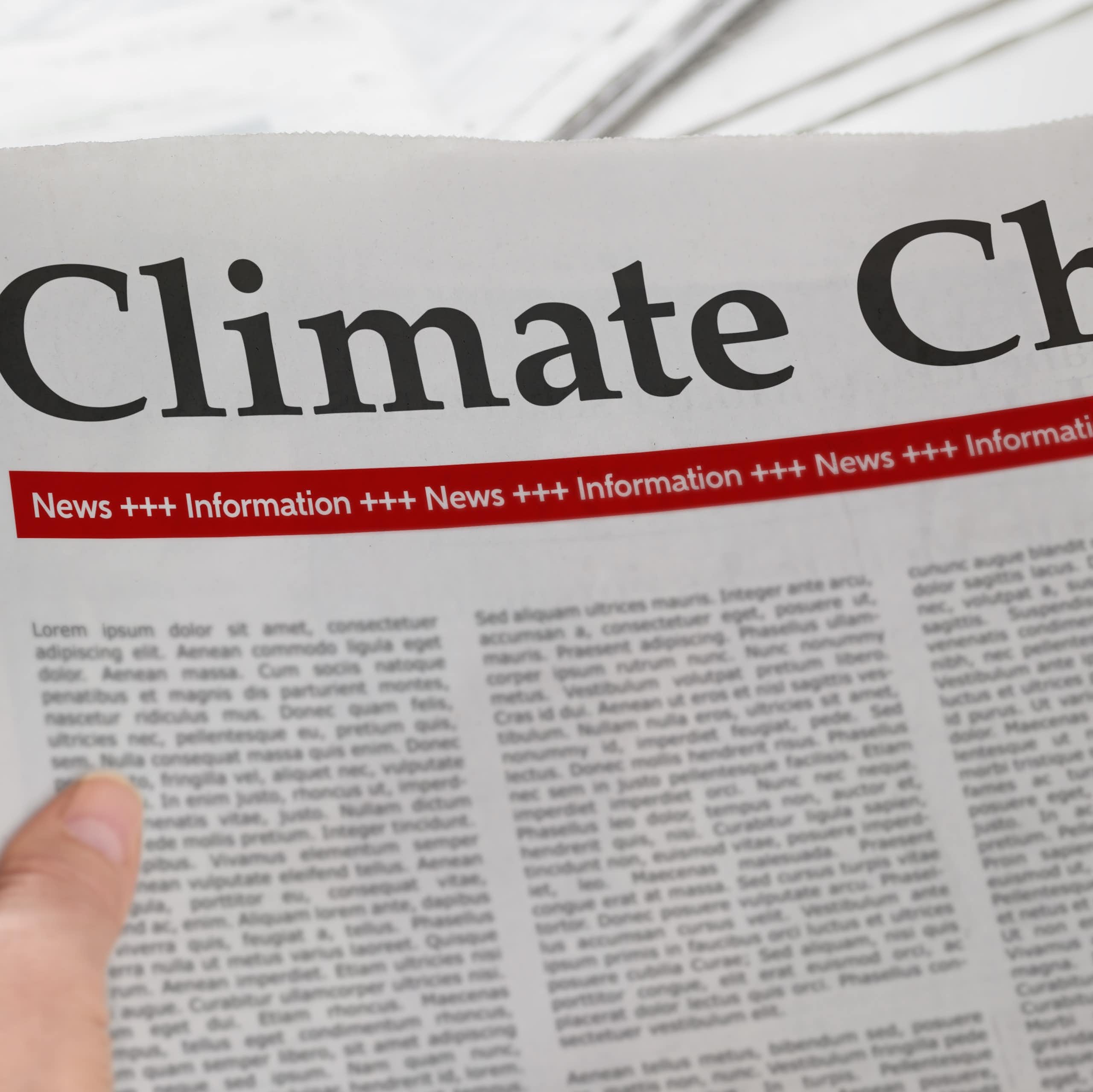 Generic newspaper with 'climate change' headline