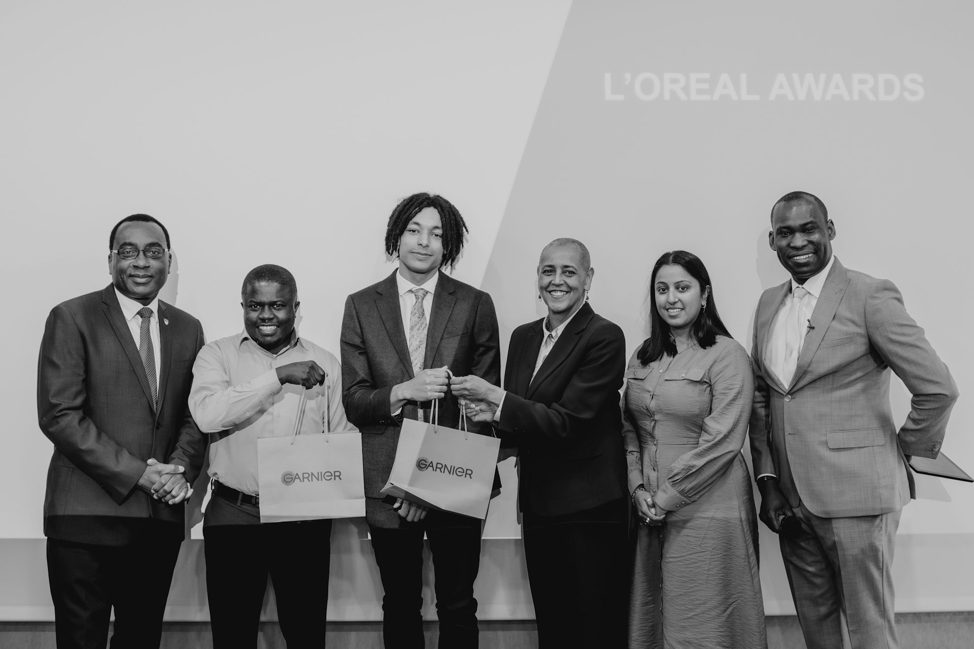 Group of people in black and white photo