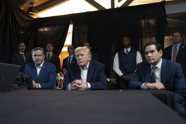 Donald Trump, John Ratcliffe and Marco Rubio watch a feed of US forces capturing Maduro.