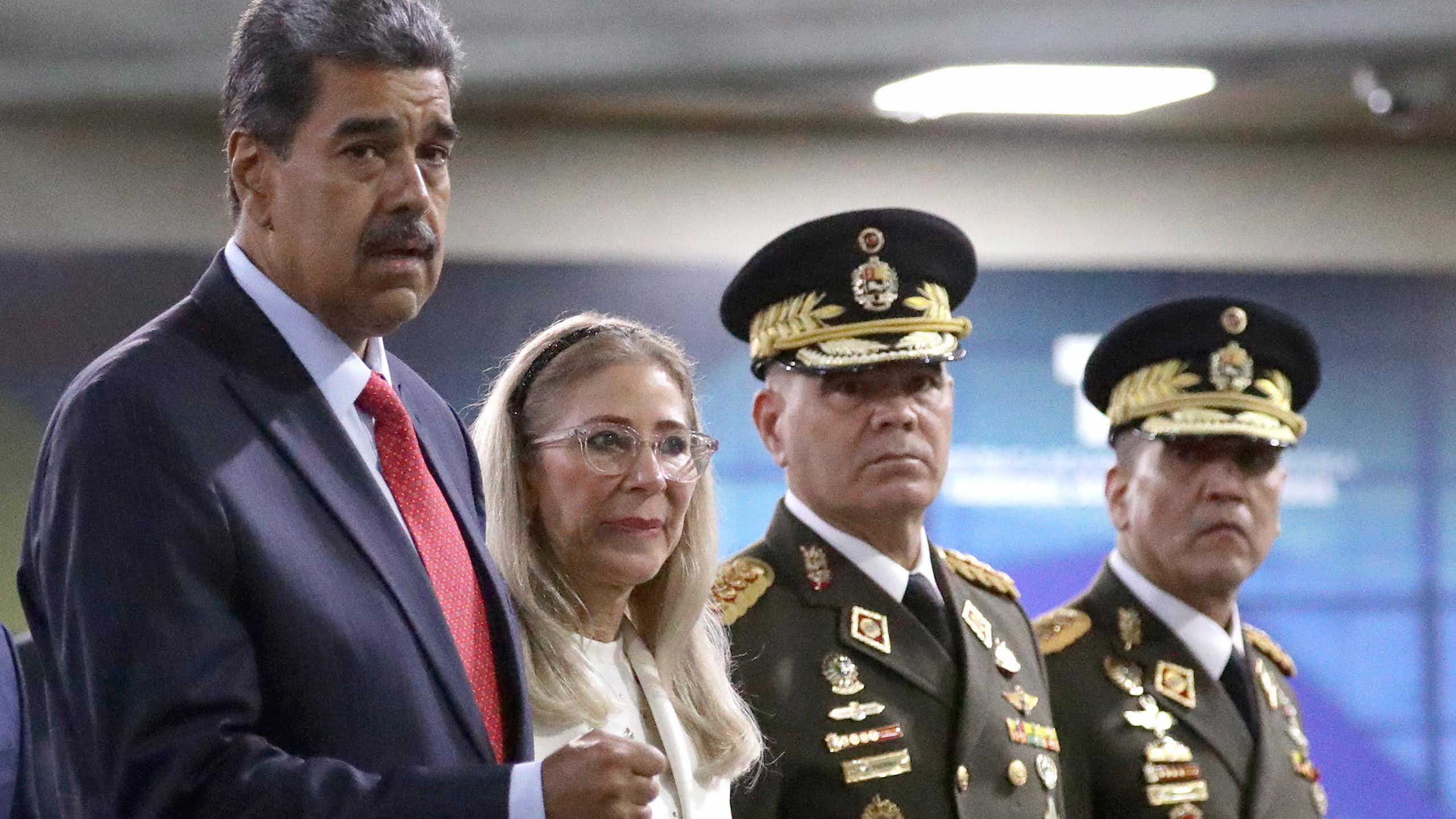 Nicolás Maduro and his wife arriving at a court in Caracas.