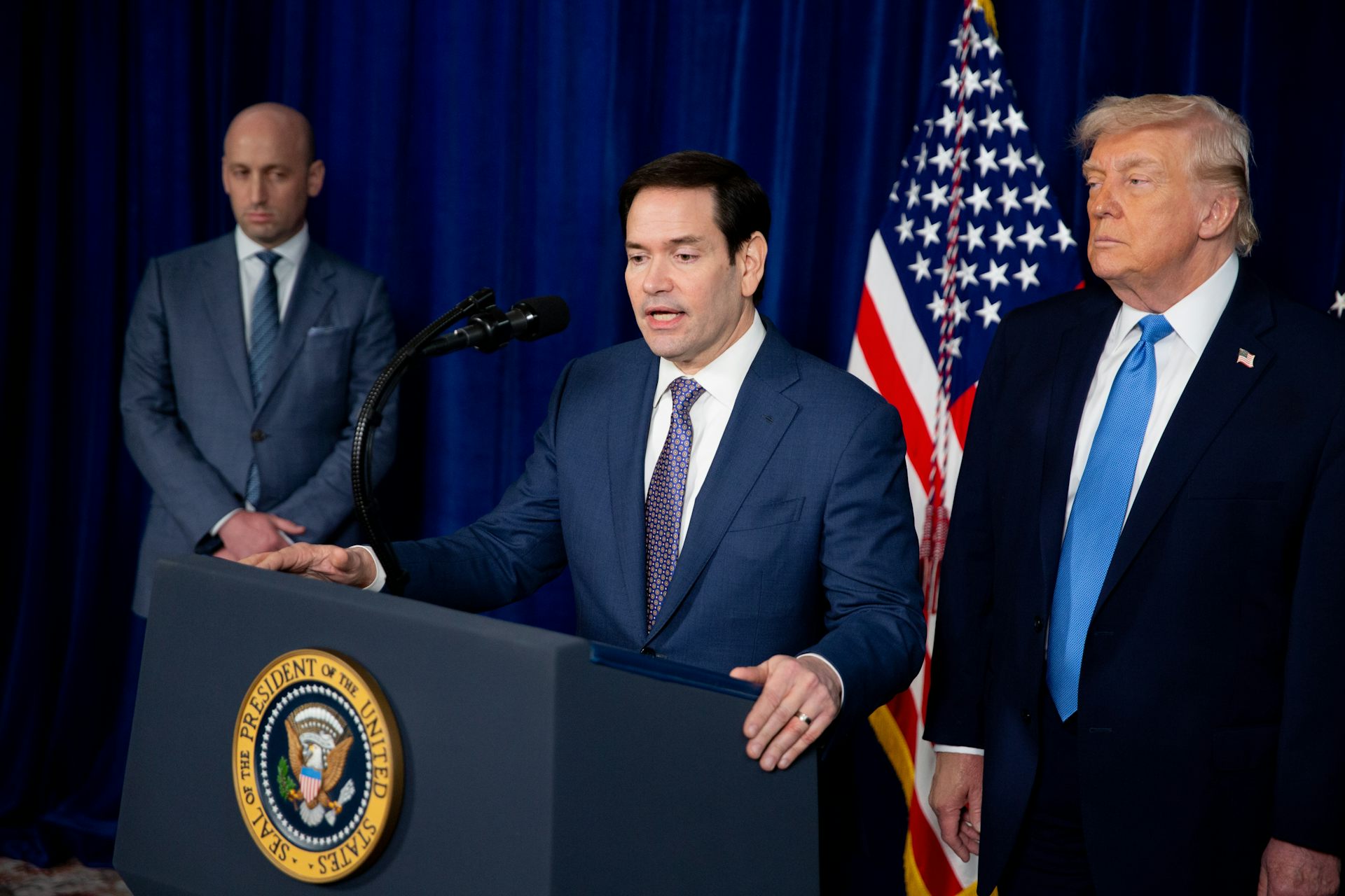 Marco Rubio speaks during a news conference alongside Donald Trump.