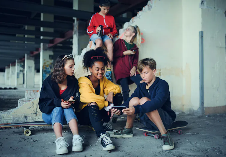 A group of teenagers spending time together.