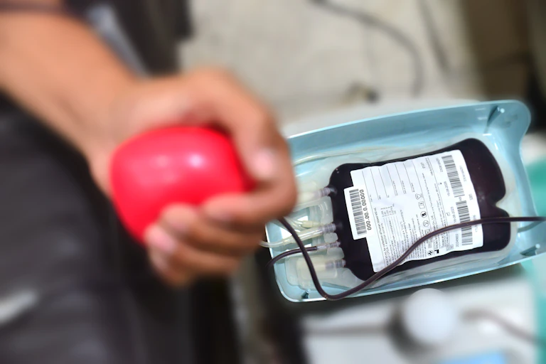 Person donating blood.
