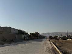 An empty road in a deserted village.