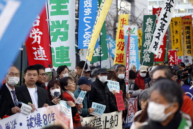 Japanese people attend a protest in Tokyo.