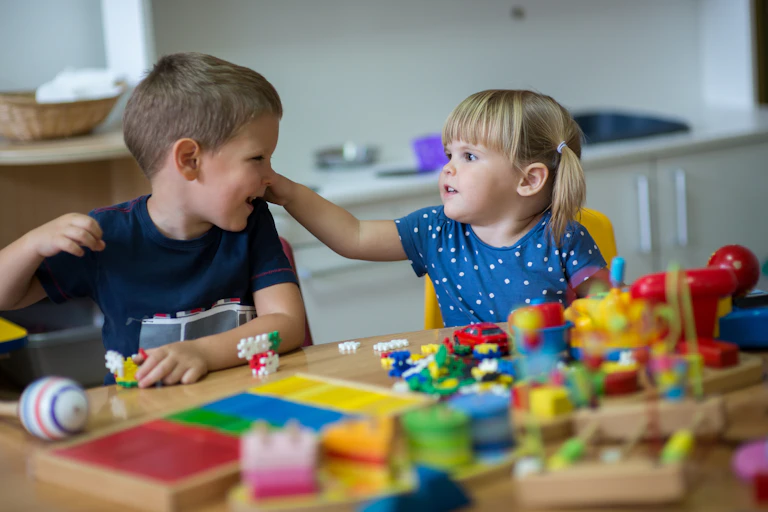 Small children playing and talking