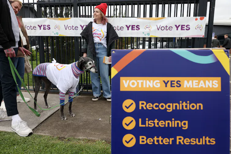 A sign says voting yes means recognition, listening and better results.