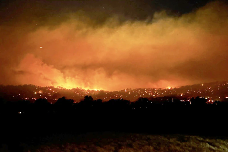 Night image of bushfire burning near the town of Longwood