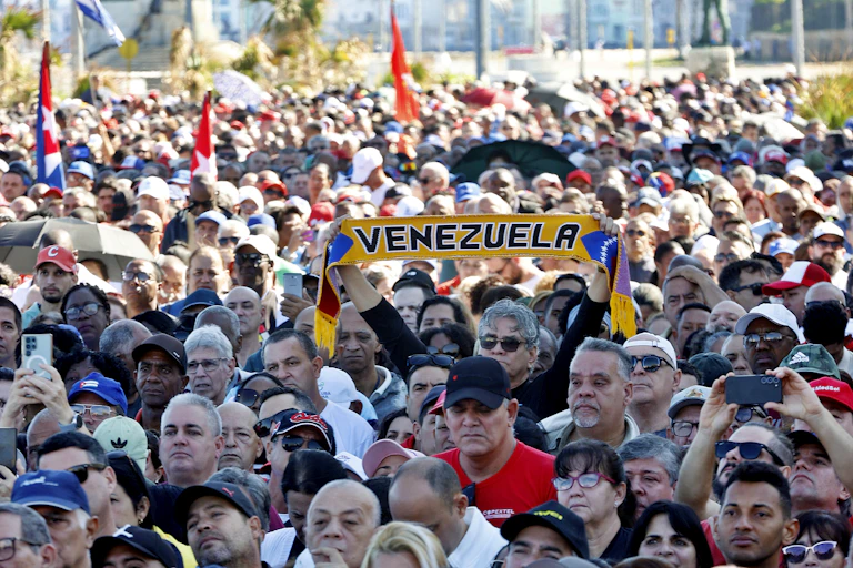 Cubans attend a demonstration in support of Venezuela.