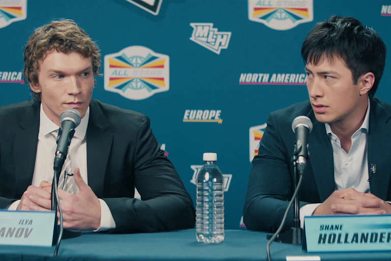 Two hockey players in a press conference