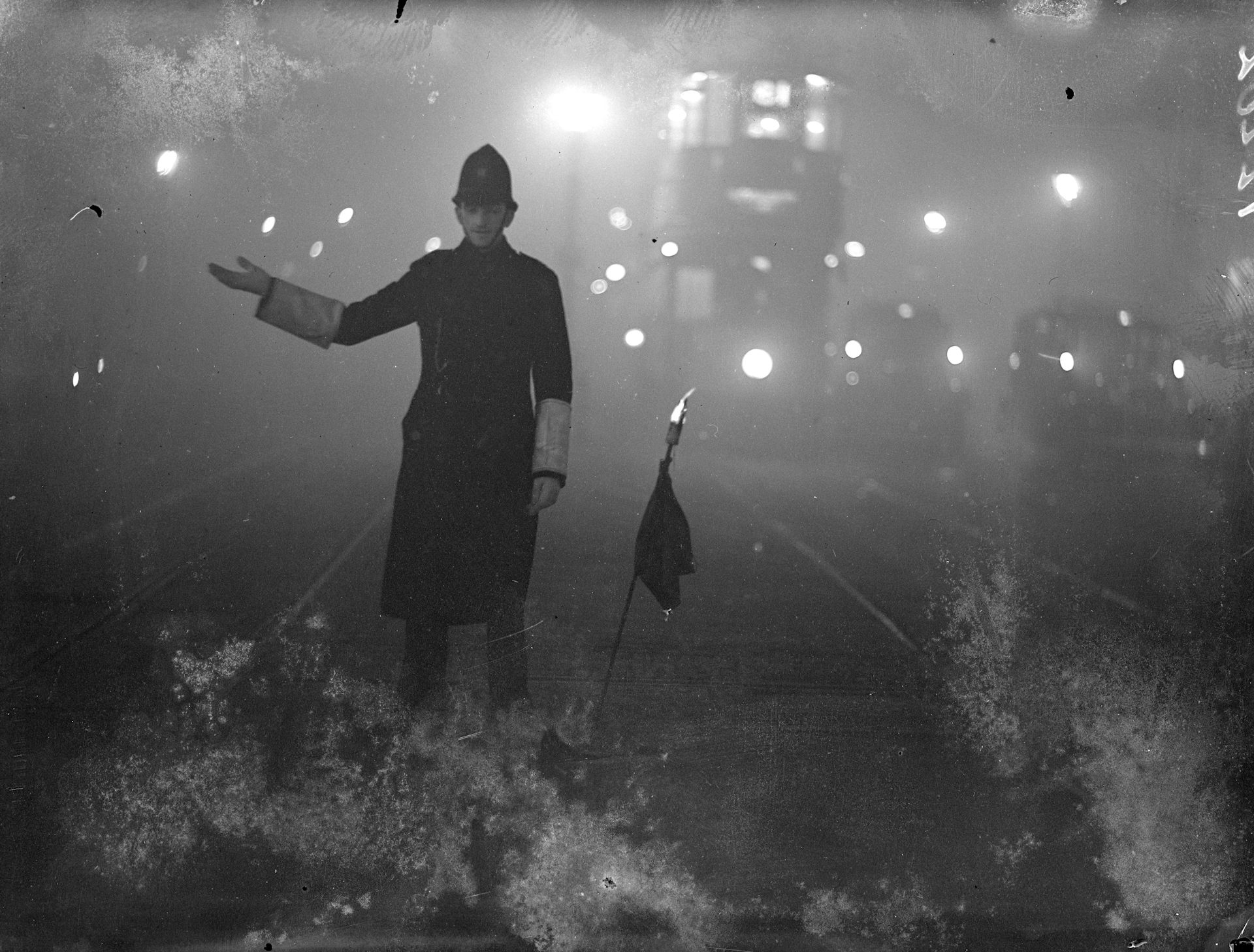 A police man in the London fog