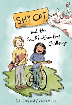 A book cover with two children and a cat.