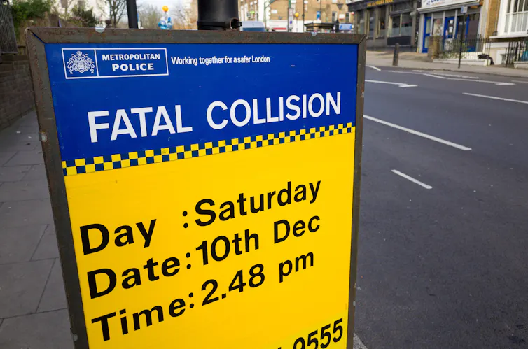A road sign referring to a fatal collision in London