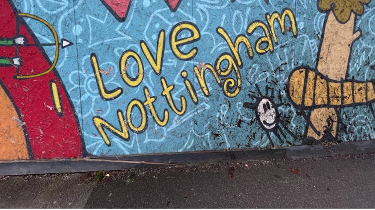 Brightly painted mural on a wall with the phrase 'I love Nottingham' painted on it