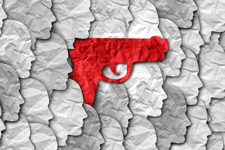 A red gun is juxtaposed against cut-out profiles of people.