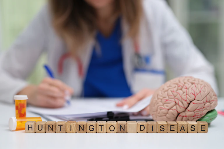 A brain and a jar of pills with a doctor in the background.