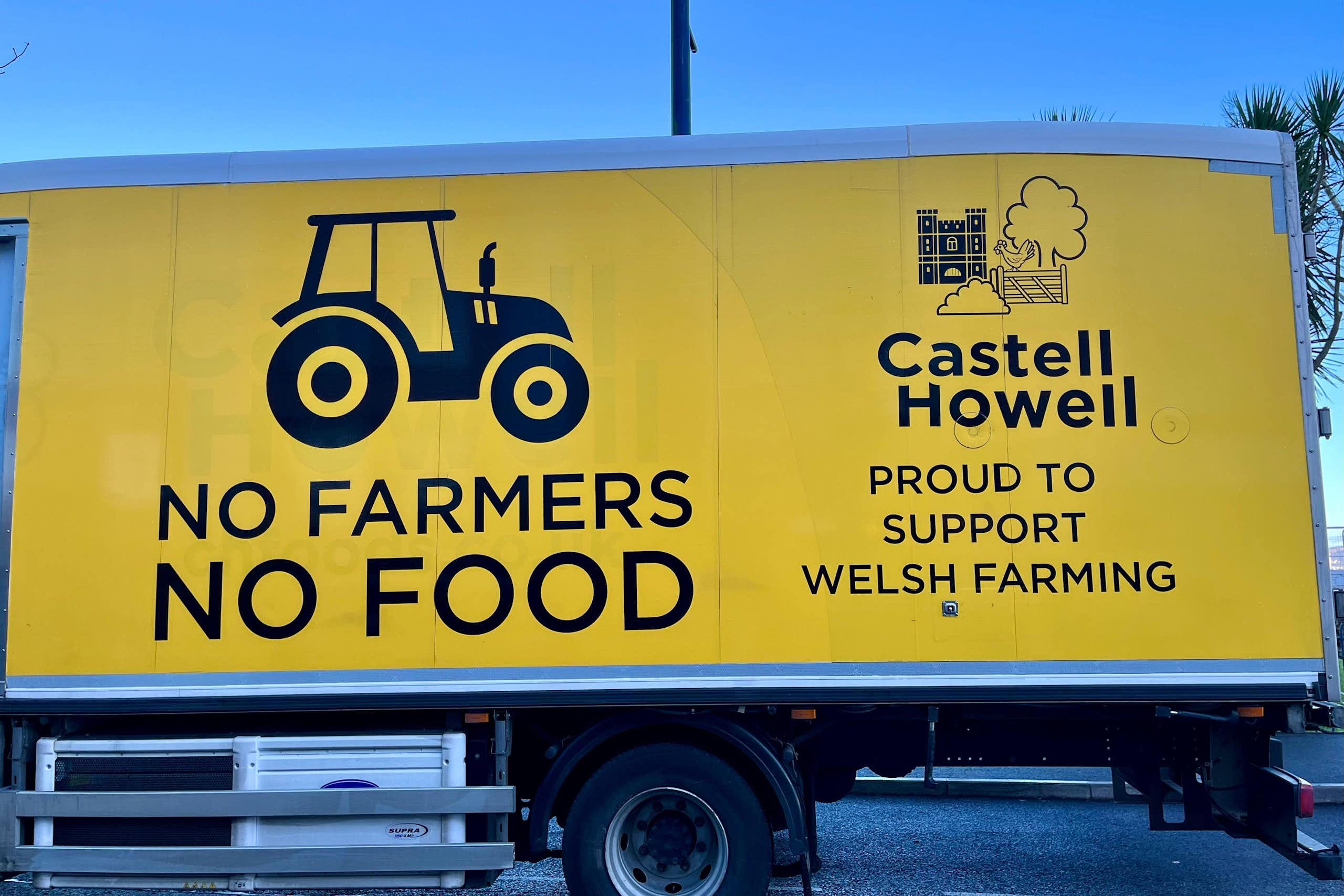 A lorry carrying a slogan about a Welsh farmers protest parked in Swansea, Wales.