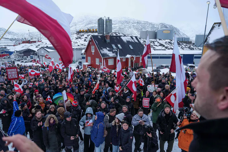 Crowd of people with Greenland flags