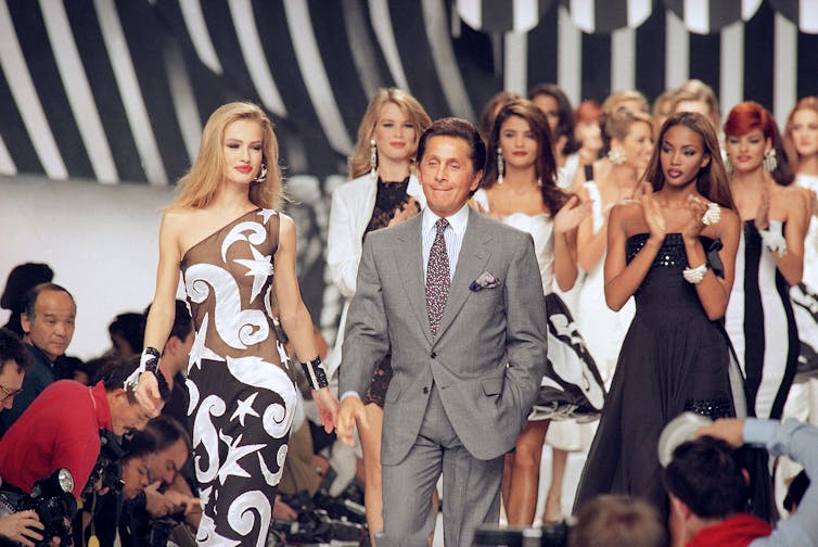 The runway featuring models in black and white.