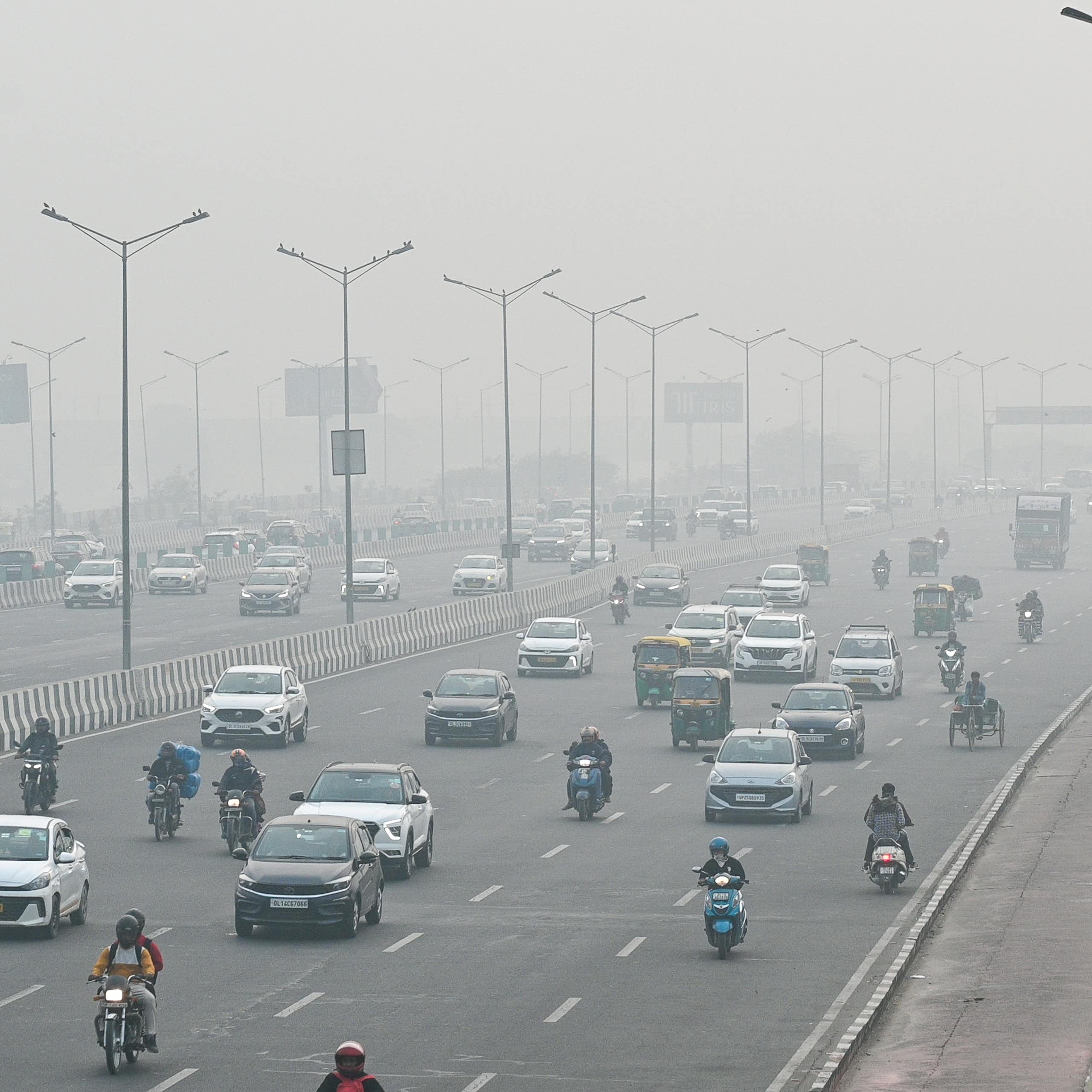 A busy road with smoggy air.