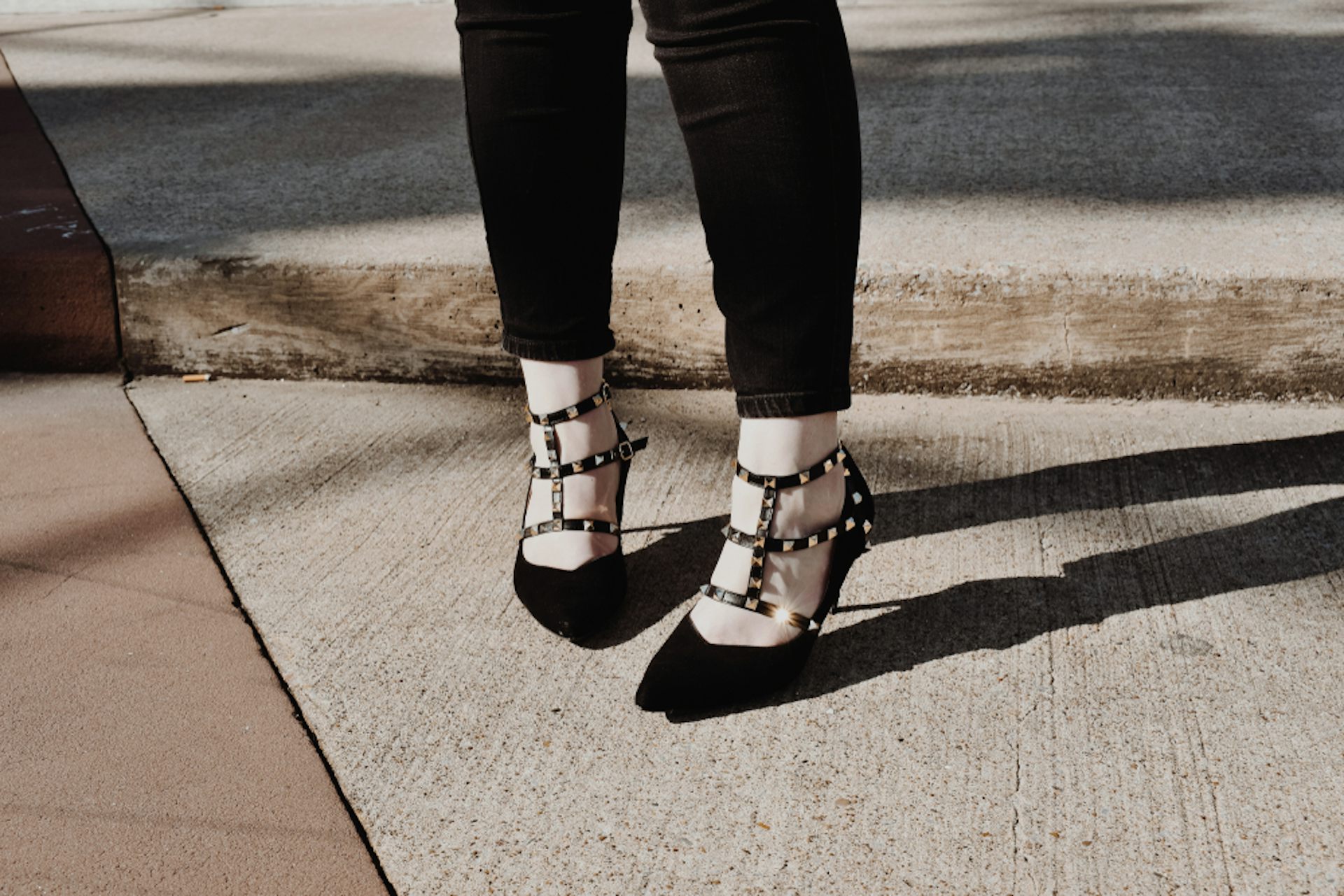 Photo of feet with shoes.