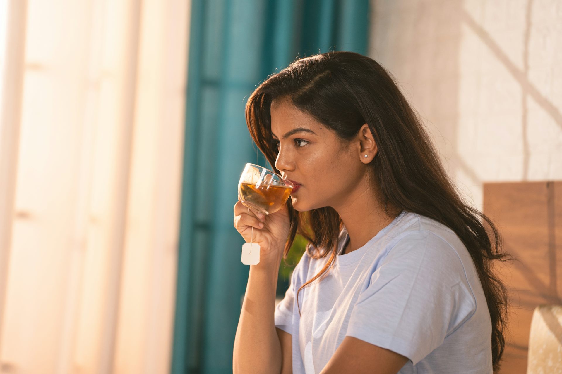 A woman drinking tea