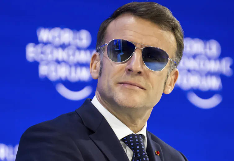 President Emmanuel Macron attends a plenary session at the Congress Hall in Davos, Switzerland