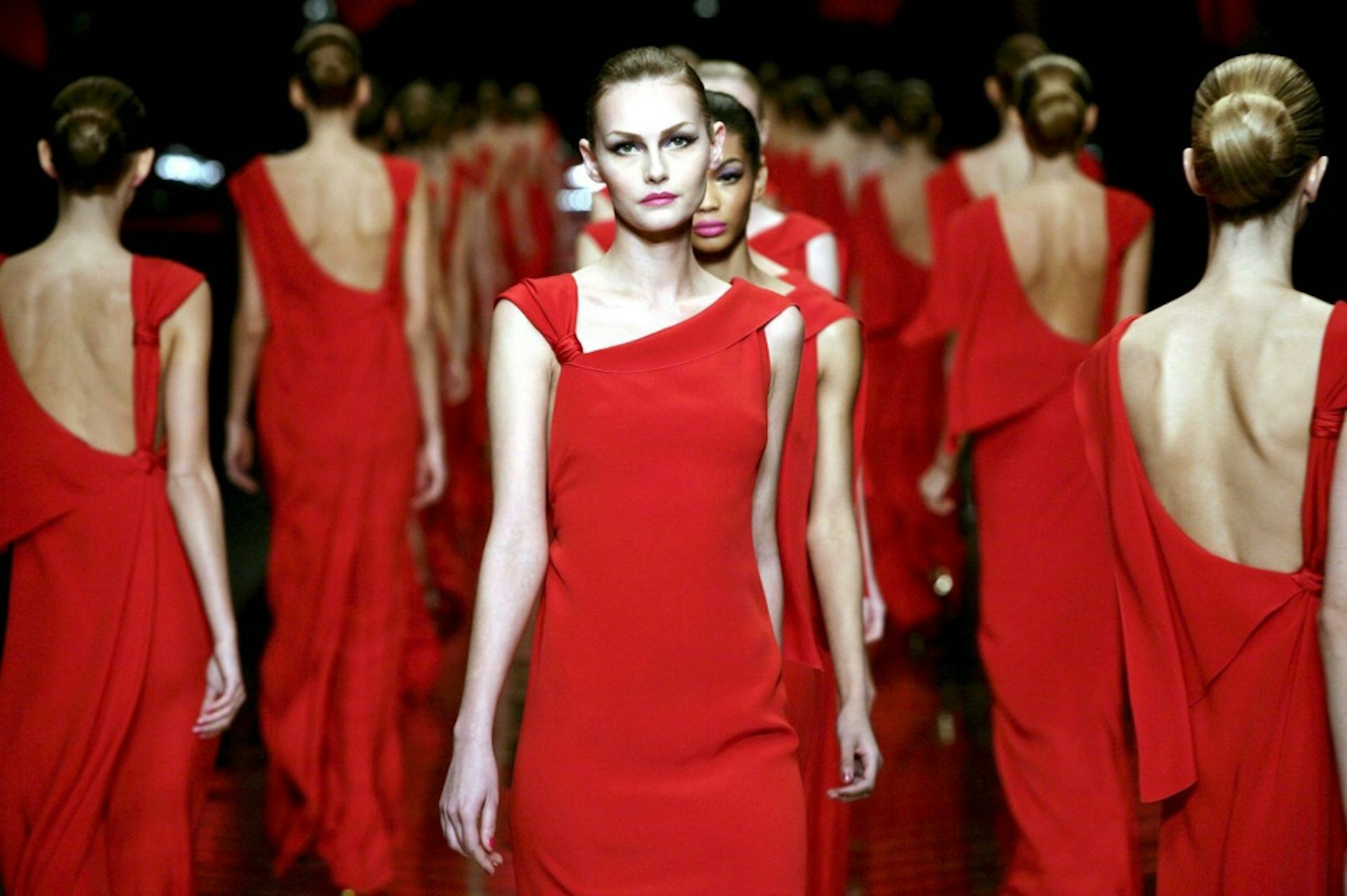 Models in red dresses