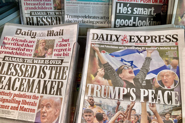 Newspaper headlines praising Donald Trump as a peacemaker.
