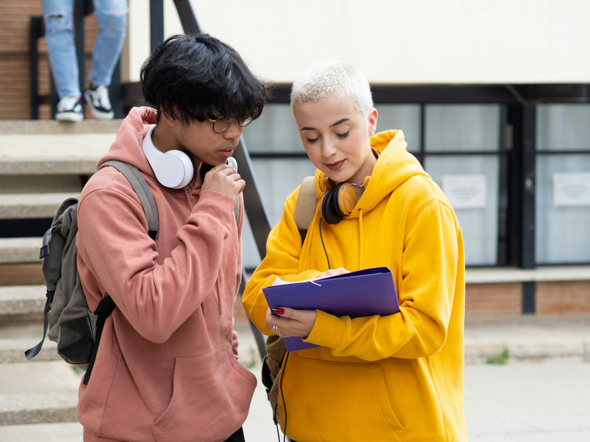 Students looking at information on paper