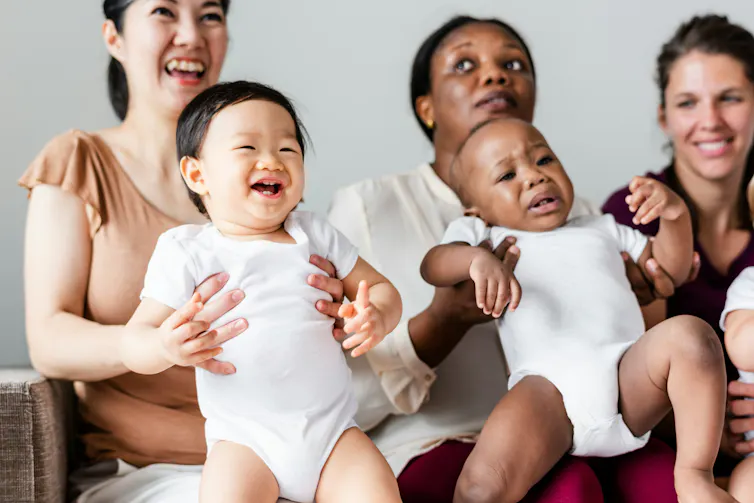 three mothers with three babies
