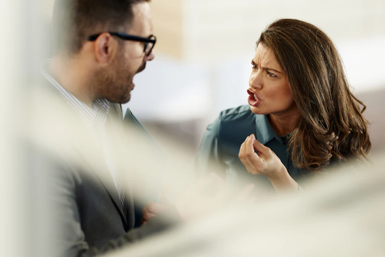 Man and woman heatedly arguing