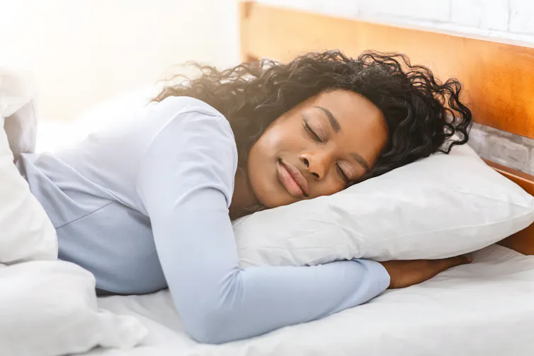 Woman asleep in bed