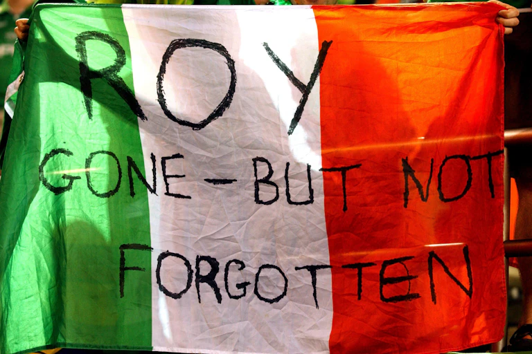 An Irish flag proclaiming: 'Roy - gone but not forgotten'.