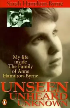 book cover, with a sad woman's face on it, and an inset photo of Anne-Hamilton-Byrne kissing a child's head