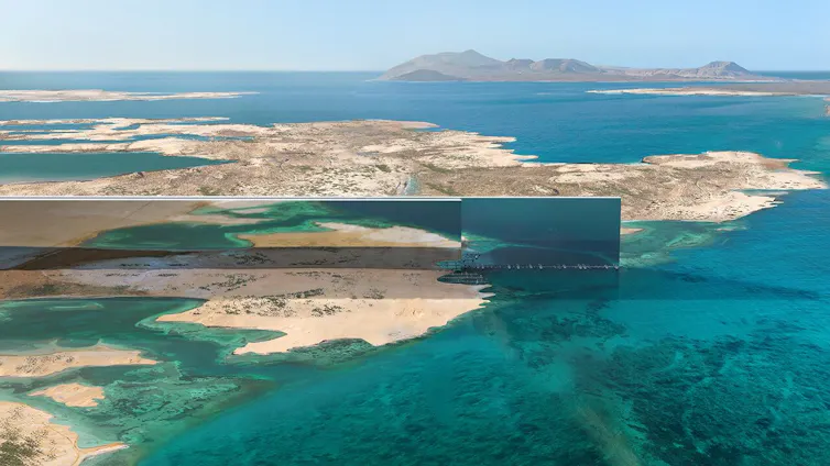 A digitally generated image of a wall covered by crystal in the dessert and surrounded by the ocean