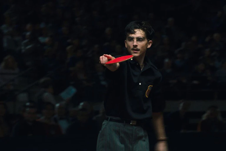 Timothée Chalamet playing table tennis