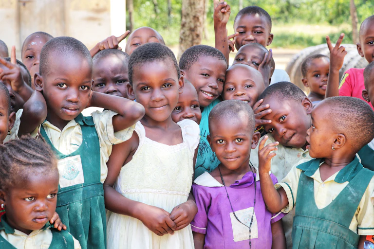 School children gather in a village in Uganda