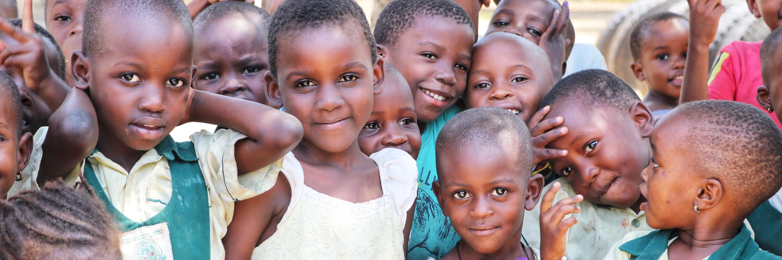 School children gather in a village in Uganda