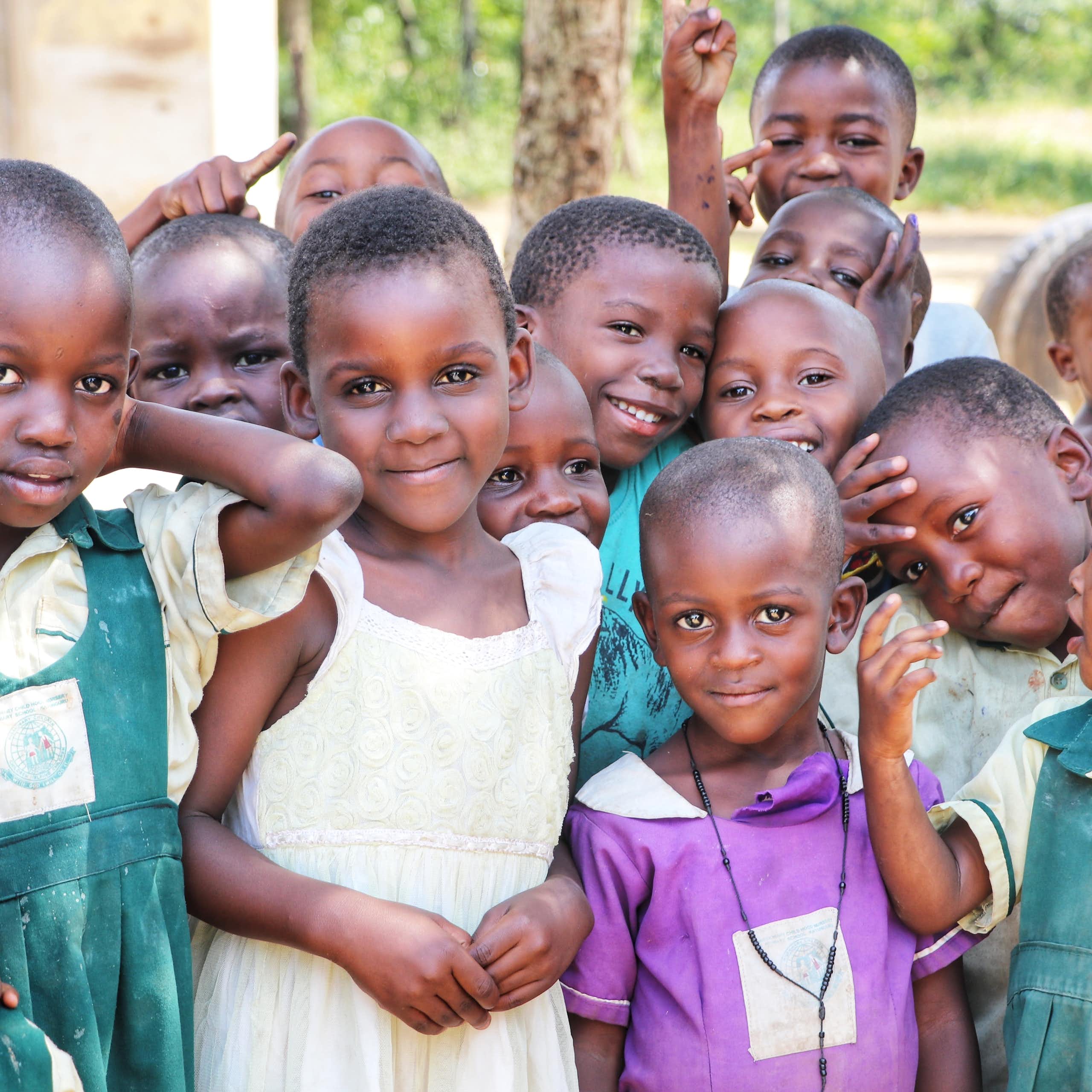 School children gather in a village in Uganda