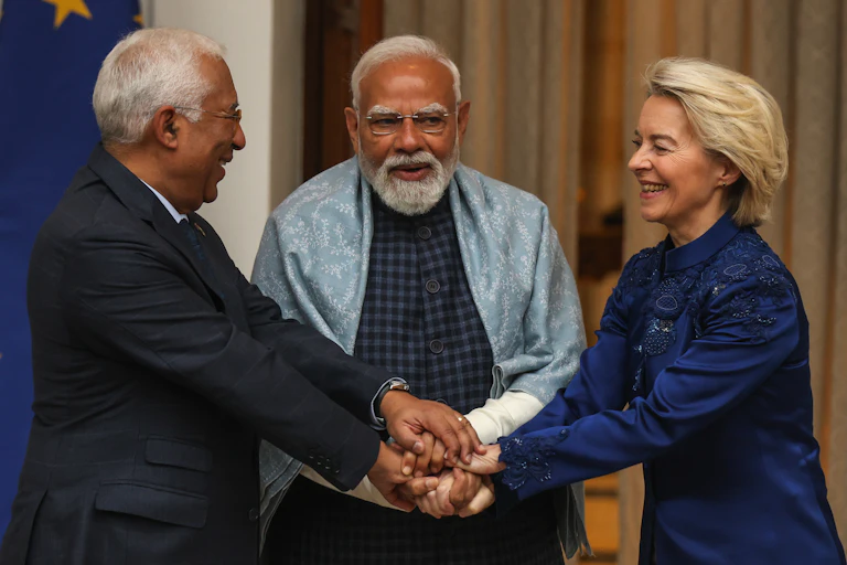 President of the European Commission Ursula von der Leyen and President of the European Council Antonio Luis Santos da Costa shake hands with Indian Prime Minister Narendra Modi