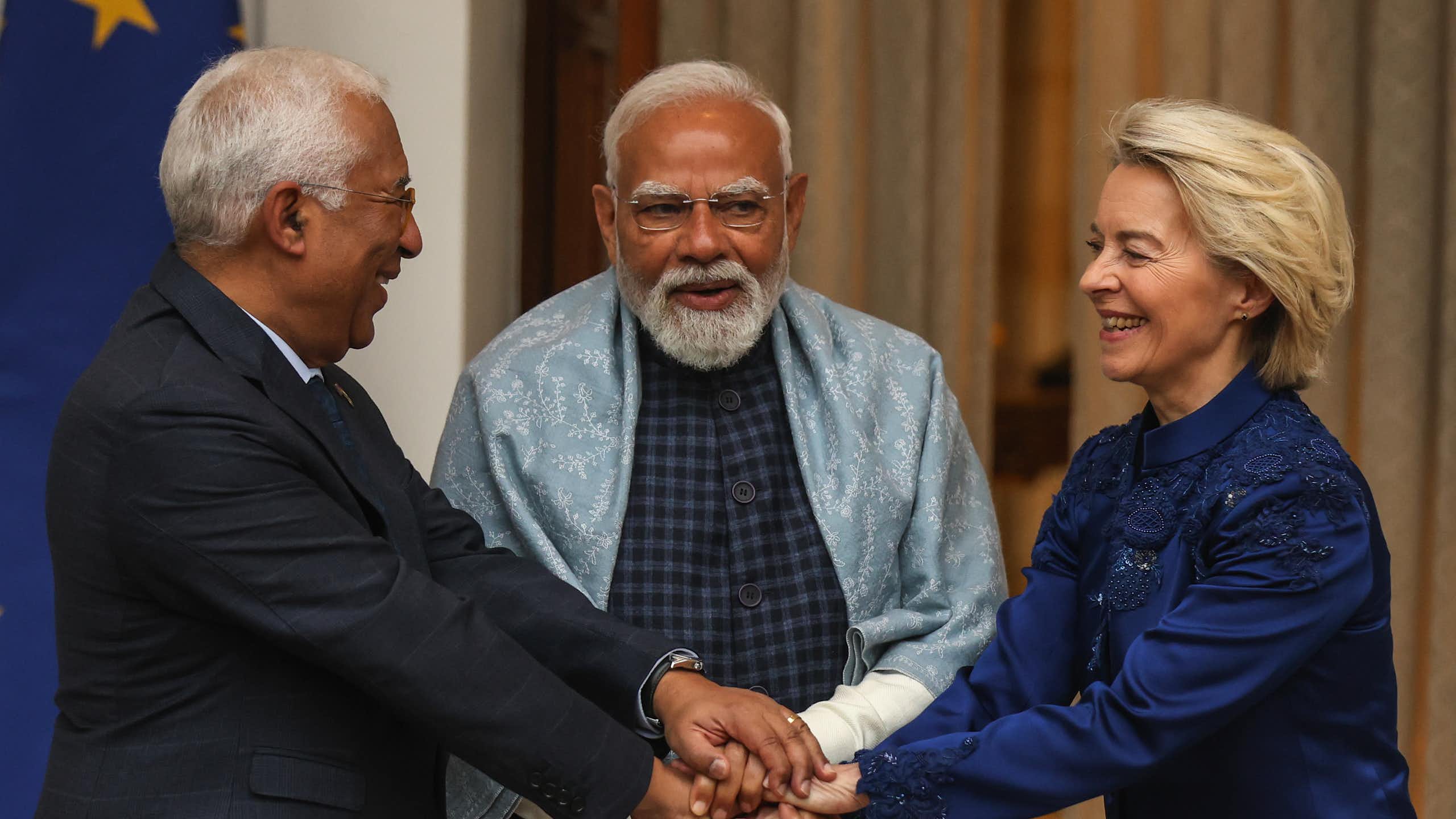 President of the European Commission Ursula von der Leyen and President of the European Council Antonio Luis Santos da Costa shake hands with Indian Prime Minister Narendra Modi