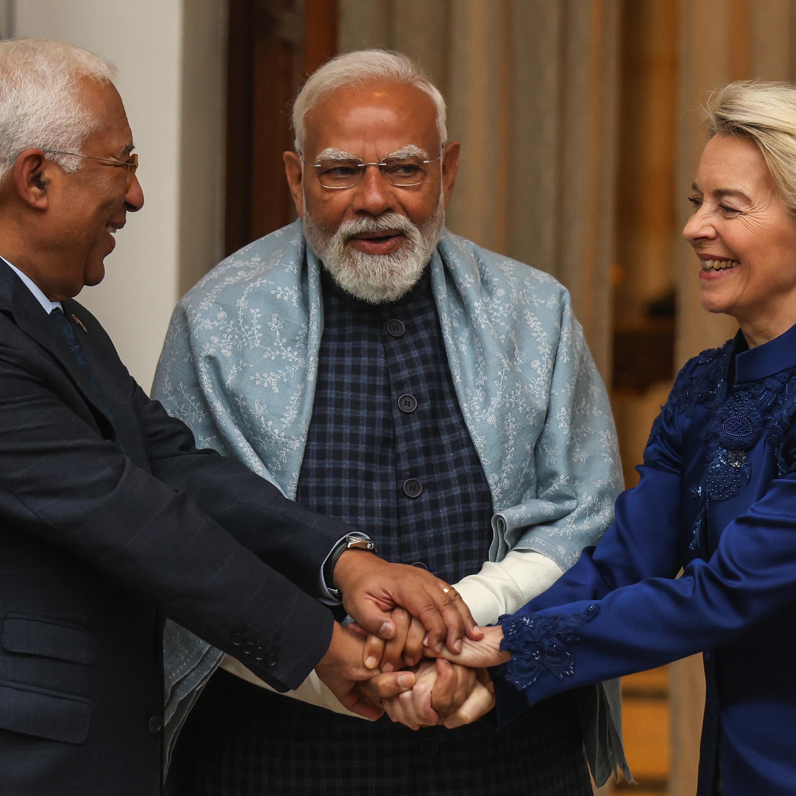 President of the European Commission Ursula von der Leyen and President of the European Council Antonio Luis Santos da Costa shake hands with Indian Prime Minister Narendra Modi