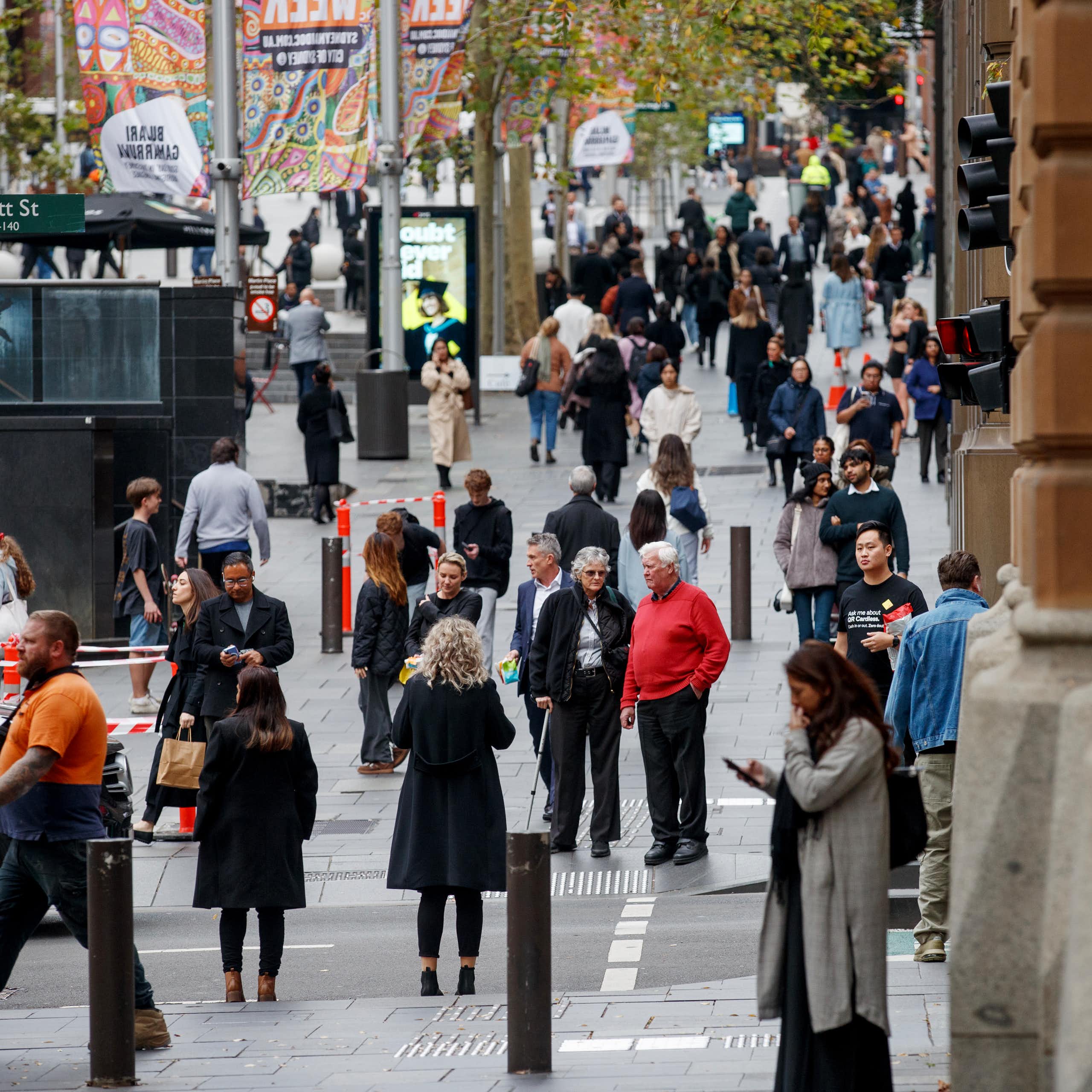 People move through Martin Place in the CBD of Sydney