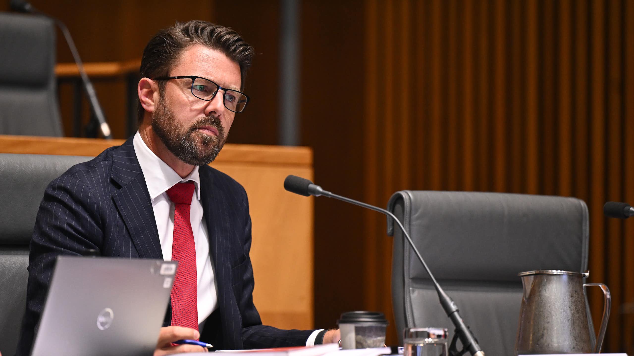 Liberal Home Affairs Minister Jonno Duniam listens during the Joint Committee review of the Exposure Draft: Combatting Antisemitism, Hate and Extremism Bill 2026