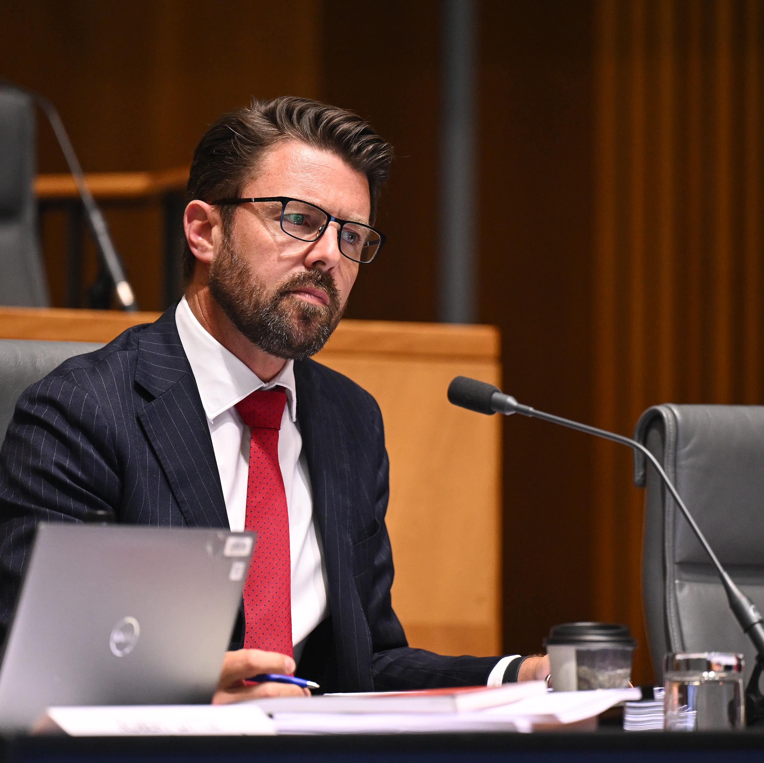 Liberal Home Affairs Minister Jonno Duniam listens during the Joint Committee review of the Exposure Draft: Combatting Antisemitism, Hate and Extremism Bill 2026