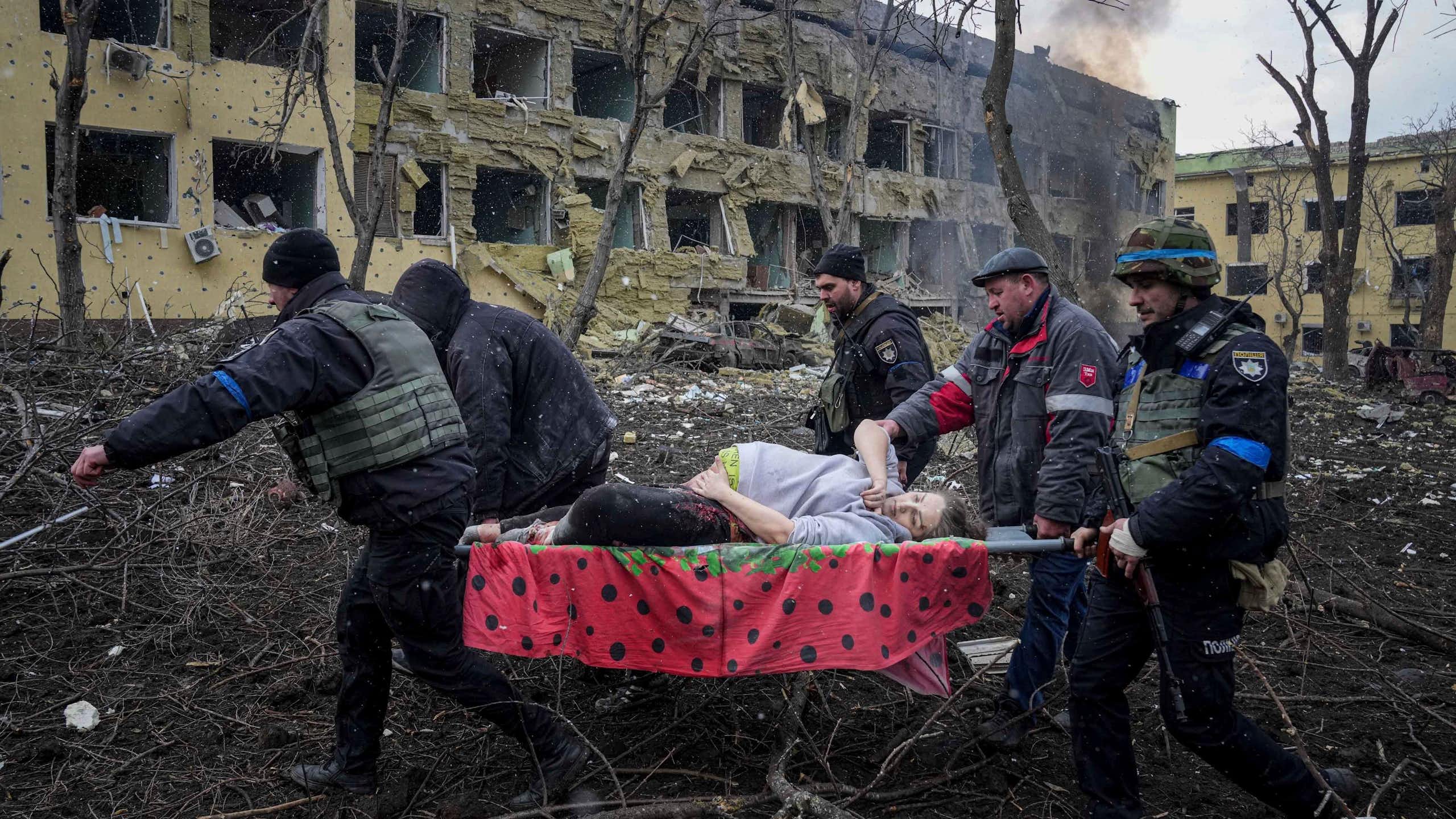 A pregnant woman being evacuated from a hospital in Mariupol, Ukraine, March 9, 2022.